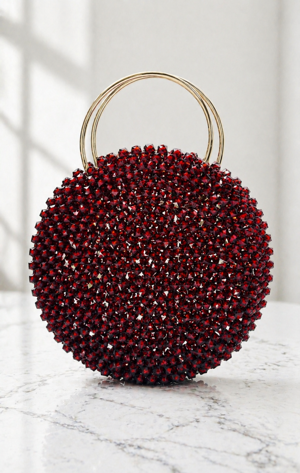 Garnet Orb — deep burgundy circular beaded bag